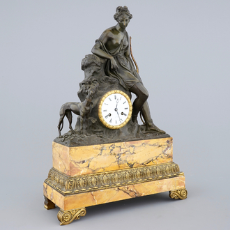 A Charles X patinated bronze and Siena marble striking mantel clock, ca. 1820-30, France